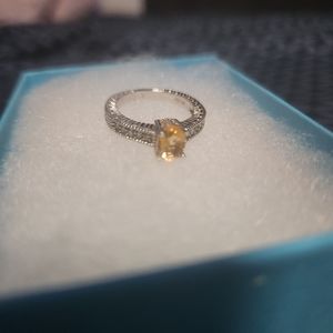 925 stamped sterling silver diamond ring with oval topaz